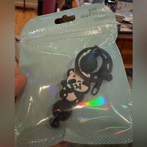 Cute Panda Keychain with a hint of Green.